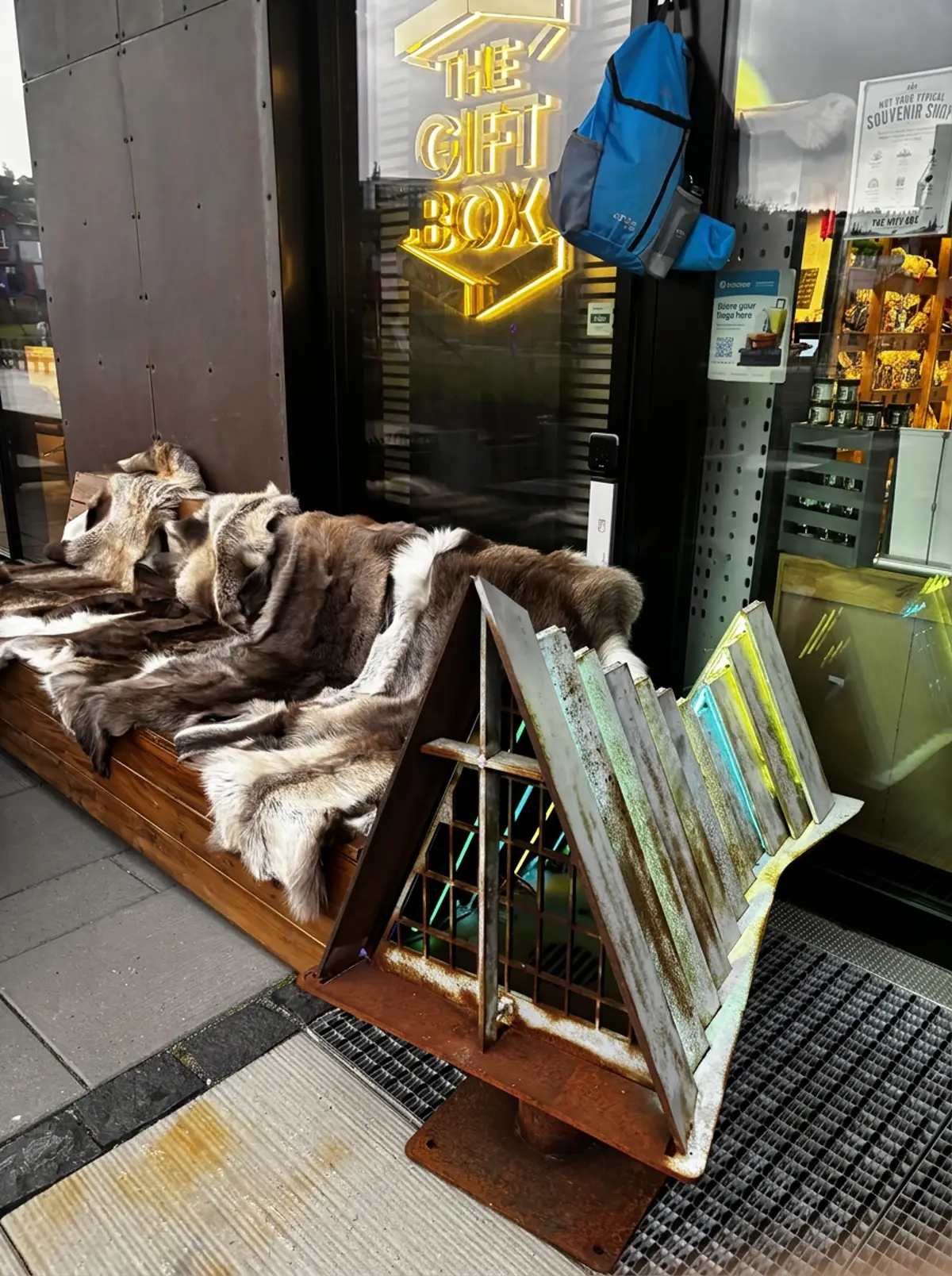 Reindeer hides and handmade metal decor by The Gift Box entrance